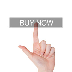 Female hand pushing on a buy now sign