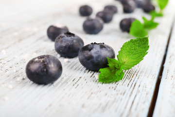 Blueberries on wooden background closeup