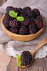 Wooden bowl of blueberries
