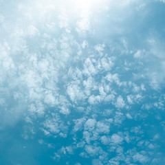 Blue sky with sun and cloud