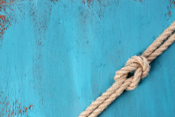 Marine knot on wooden background