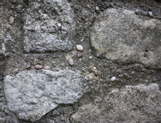 Rough gray rock wall background texture