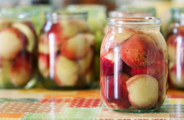 Jars of homemade peach preserves