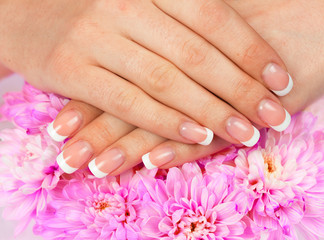 Obraz na płótnie Canvas Beautiful woman's hands with perfect french manicure