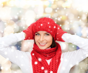 smiling young woman in winter clothes