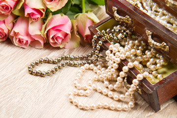jewelry box with jewelry  with pink roses