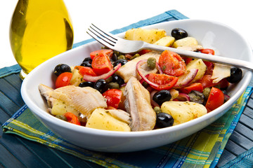 Mackerels with potatoes,tomatoes,capers and olives