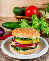 homemade hamburger with fresh vegetables, close up