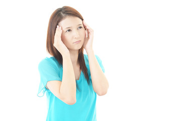 Fototapeta premium 頭痛を訴える女性