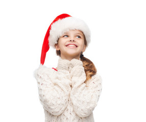 dreaming girl in santa helper hat