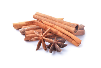 Anise stars and cinnamon sticks  on white background