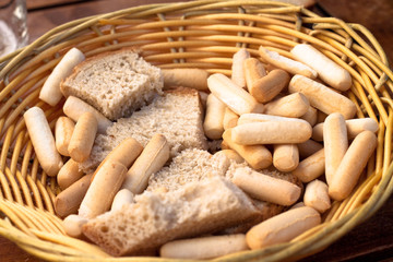 Basket with bread and bread sticks