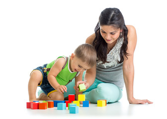 kid boy and mother playing together with block toys © Oksana Kuzmina