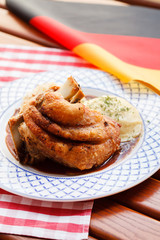 eisbein with braised cabbage and potato