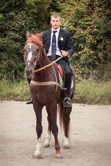 groom on horse