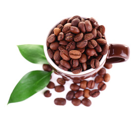 Mug of coffee beans isolated on white
