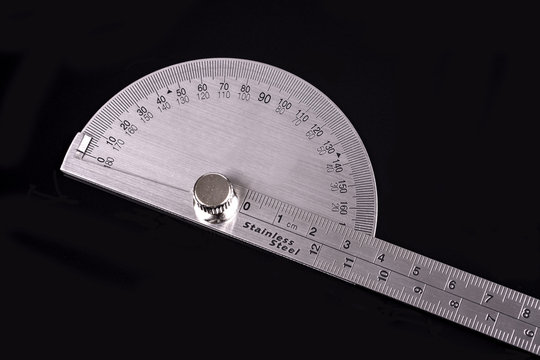 Protractor on black