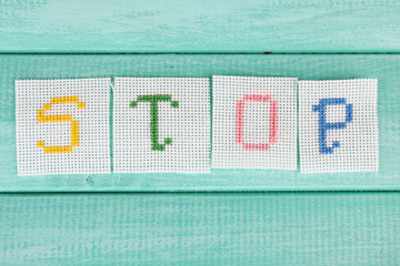 Word made embroidered letters