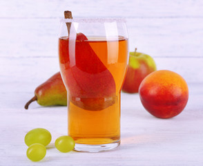 tasty summer drink with fresh fruits, on wooden table