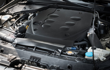 Fototapeta premium Dirty car engine, detail view. Selective focus.