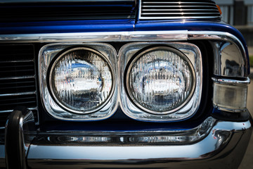 Headlight of a vintage car.