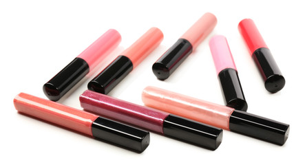 Beautiful lip glosses, isolated on white