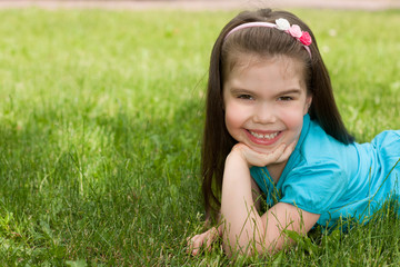 Little girl on the grass