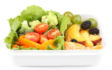 Tasty vegetarian food in plastic box, isolated on white