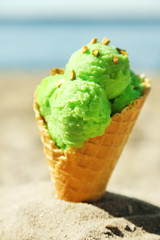 Ice cream in sand on beach