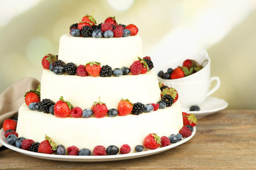 Beautiful wedding cake with berries © Africa Studio