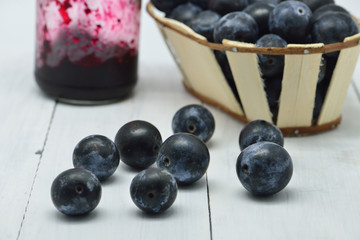 black plums in white background