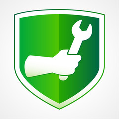 Sign of warranty service, repair or fixing industrial logo concept. Worker hand with wrench, creative identitiy icon. Shield shape, green and white colors. Isolated abstract graphic design template.