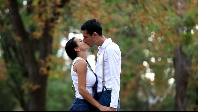 Couple hugging in the park.