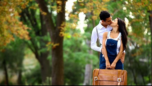Couple hugging in the park.