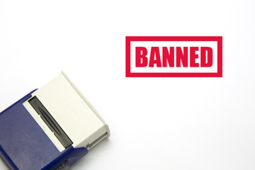 Rubber stamp with word Banned on white background