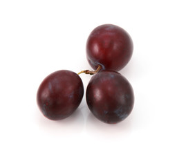 Three ripe plums