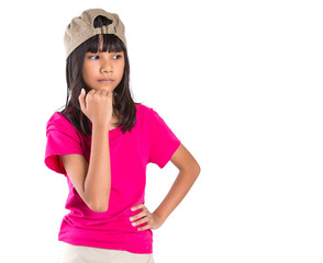 Young preteen Asian girl with a cap over white background