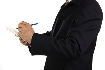 Hand of Businessman write on notebook