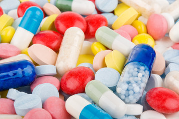 Color pills and capsules background