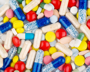 Color pills and capsules background