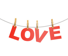 red love letters hanging on rope with clothespins