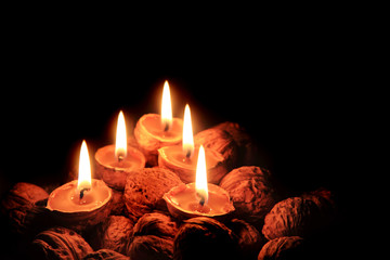 Fototapeta na wymiar christmas wallnuts candles