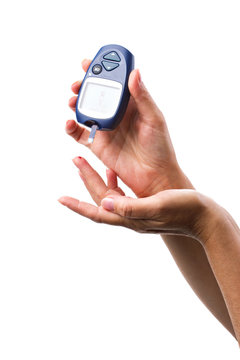 glucometer in woman's hand