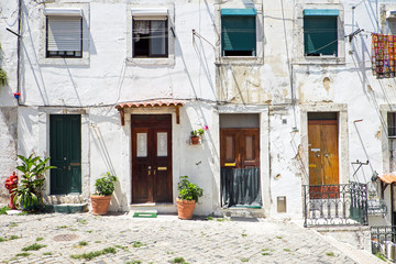Fototapeta na wymiar Four entrance doors in Lisbon