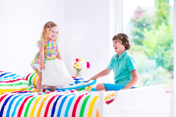 Kids having pillow fight