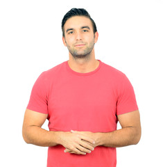 Closeup of young handsome man looking at camera