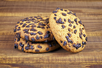 Baked cookies closeup on wooden background