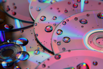 Compact disk splattered by water