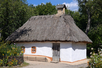 Fototapeta na wymiar Traditional Ukrainian hut, Museum of Folk Architecture