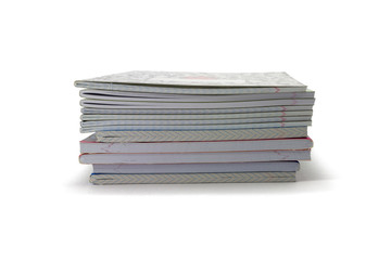 exercise books on a white background